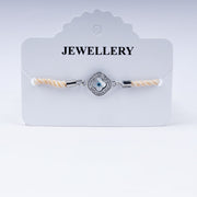 Unisex Sunny Side Up – 925 Silver Evil Eye Rakhi on Peach Twist