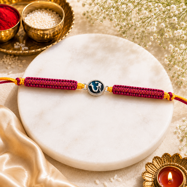 Om Enamel Rakhi in 925 Sterling Silver with Pink Braided Thread