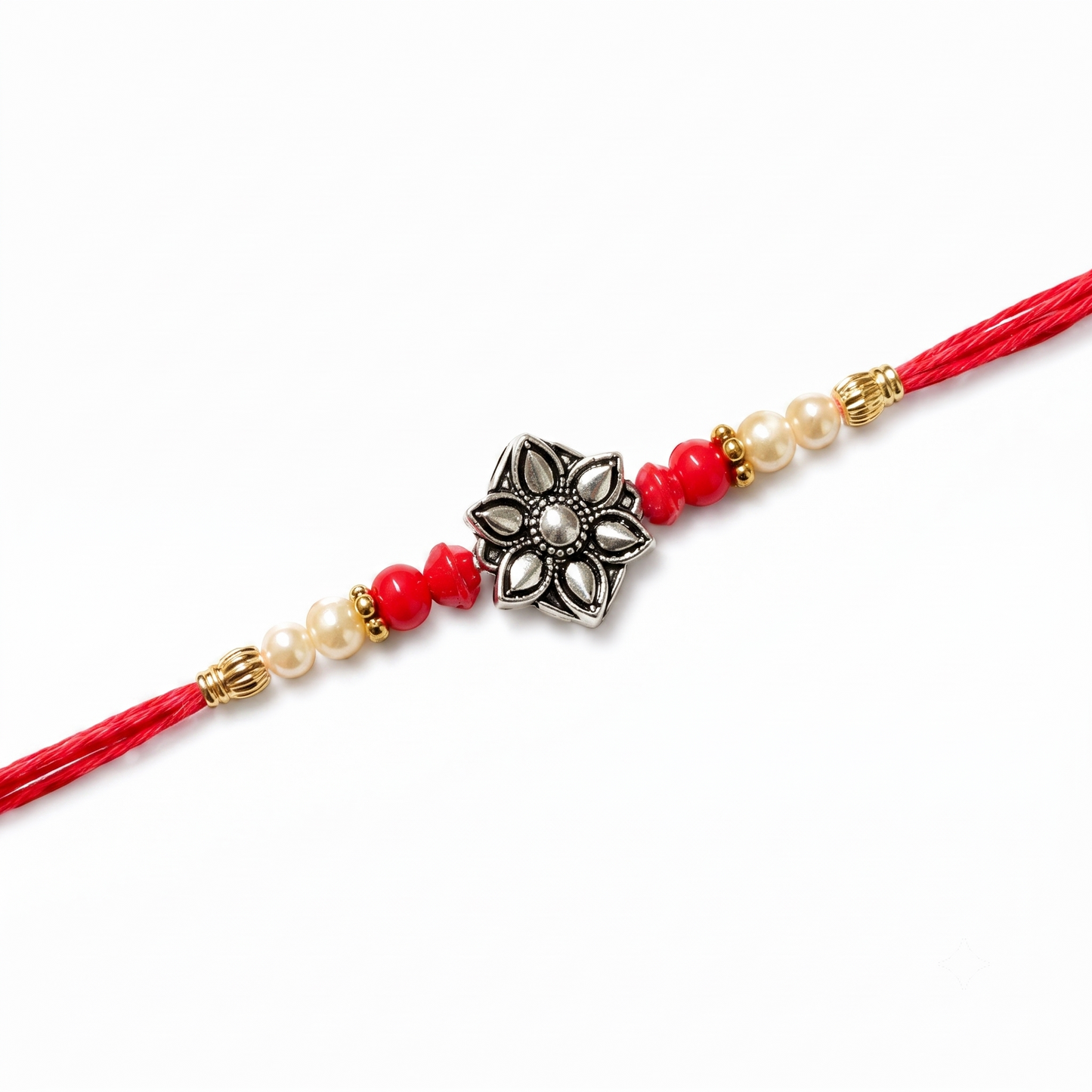 Oxidized Floral Rakhi in 925 Sterling Silver with Red Thread & Pearl Beads